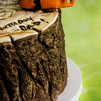 Tree stump cake with husqvarna chain saw 