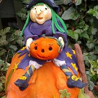 Halloween Witch on pumpkin 