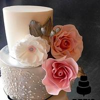 Modern pink and silver wedding cake