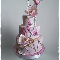 Wedding cake with magnolia flowers