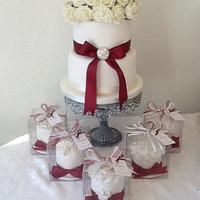 Two tie white dome rose wedding cake and gift cakes
