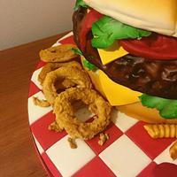 Giant Hamburger cake, fries and onion rings