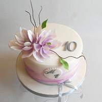 Romantic cake with magnolia flower