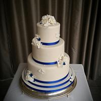 Royal blue and ivory wedding cake - cake by Lotties - CakesDecor