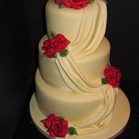 drapes and roses wedding cake 