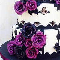 Black and purple roses wedding cake