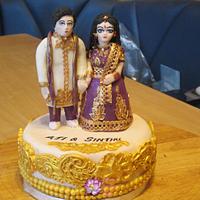 Indian style wedding cake topper