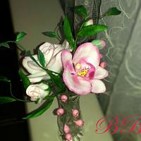 Orchid and rose spray