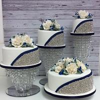 4 Tier Silver ball and navy blue wedding cake
