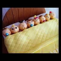 Babies in a Bed Cake