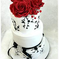 White and Black cake with red Roses 