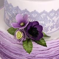 Purple and ivory wedding cake
