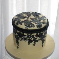 cake in ecru and black lace