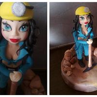 Female miner figurine
