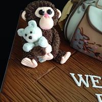 Monkey teddy and changing bag ,baby shower cake