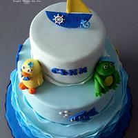 Cake with duck, frog and fish