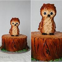 Owl on tree stump