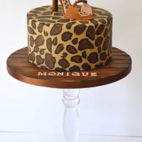 Hand painted leopard print cake sugarpaste shoe topper and wood grain board