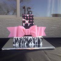 Pink and zebra print quinceanera cake