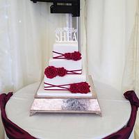 Elegant white and wine colour wedding cake 
