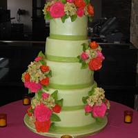 Hot pink and Orange rose wedding cake