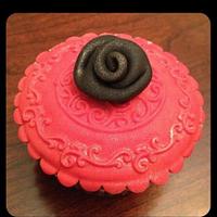 Black and red embossed cupcakes. 