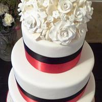 Black and Red Ribbon Cake with White Rose Bouquet
