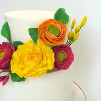 Colorful flowers for a christening cake