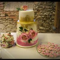 Wedding cake with flowers from edible paper