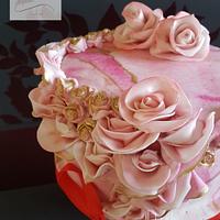Pink marbled and roses birthday cake