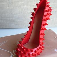 Christian Louboutin red shoe