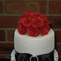Black, white and red wedding cake