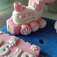 Baby girl's Christening cake with cute train and baby!