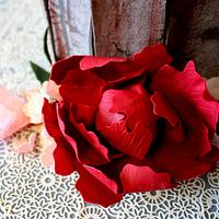 Burgundy and blush flower cake with weathered wood effect