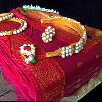 A Traditional saree and jewellery cake