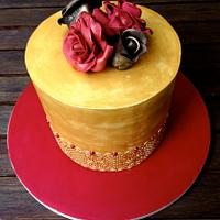 Golden cake with roses