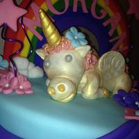 Rainbow unicorn tiered cake