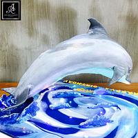 Dolphin defying cake