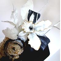 ORCHID CAKE - BLACK ,  WHITE ,GOLD AND FRILLS