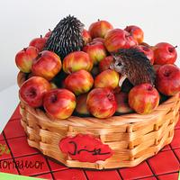 Hedgehogs in apple basket