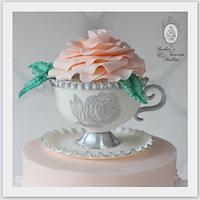 Pink and lace gravity defying cake