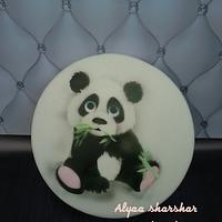 Airbrushing panda on fondant