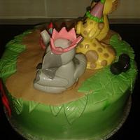 jungle themed cake elephant, giraffe & lion