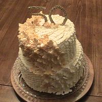 50 anniv.cake ...buttercream ruffles and fondant butterflies,start out white  and end Gold..