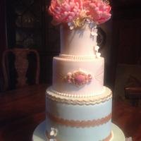 Peony rose and gold accents wedding cake