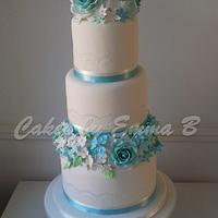 Vintage Three Tier Lace and Blue Rose Wedding Cake