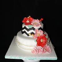 Coral and gold flowers cake