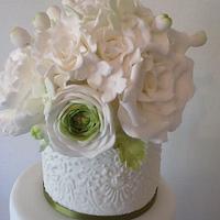 White and Green four tier wedding cake