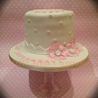Pink and ivory christening cake with a surprise inside