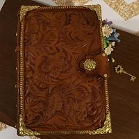 Tooled leather book cake